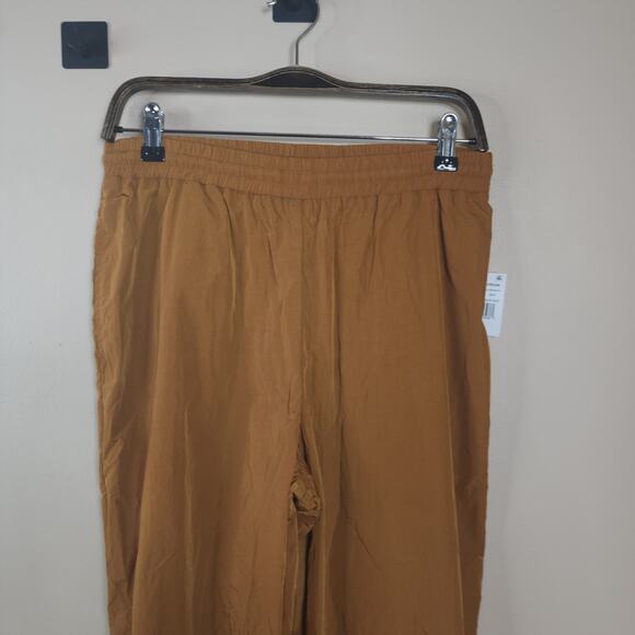 Good American Essential Nylon Track Pants in Bronze Size S - Picture 2 of 10
